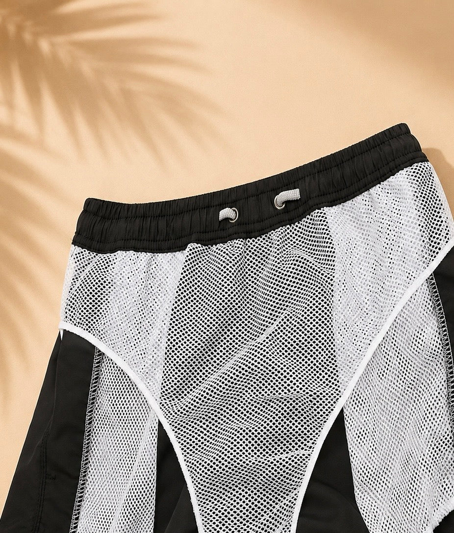 SHORT DE BAIN HOMME À SÉCHAGE RAPIDE – Confort & Performance
Le compagnon idéal pour la plage, le sport et toutes vos aventures estivales.